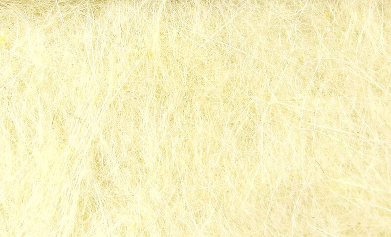 Hareline pale cream dubbing fibers for fly tying, fine wispy hair-like texture for fly bodies