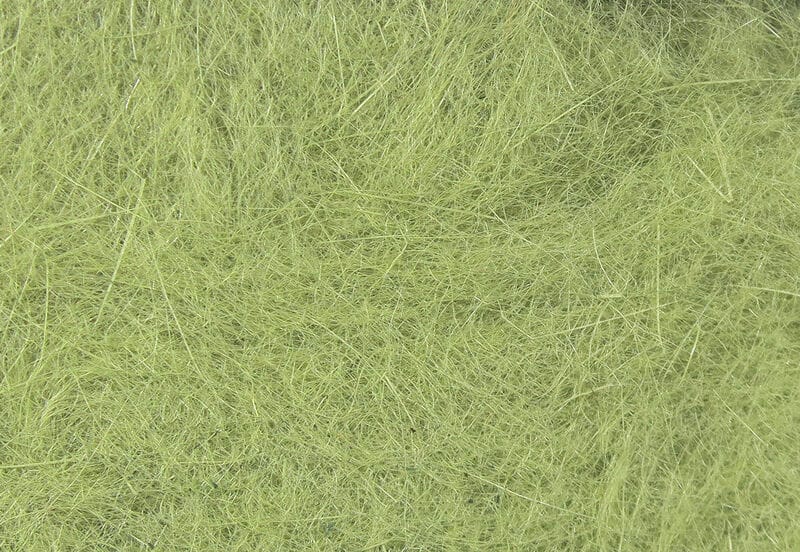 Hareline Dubbin light olive green fine synthetic dubbing fibers for fly tying, wispy fur-like texture