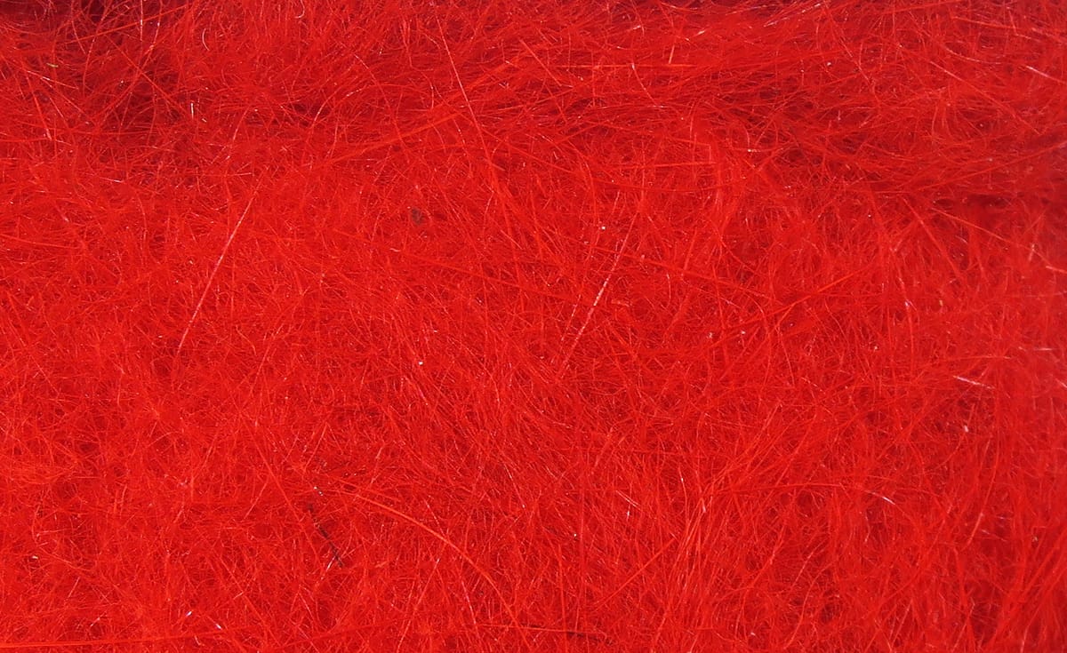 Bright red Hareline dubbin: fine synthetic fibers with wispy hairs and subtle sparkle for fly tying