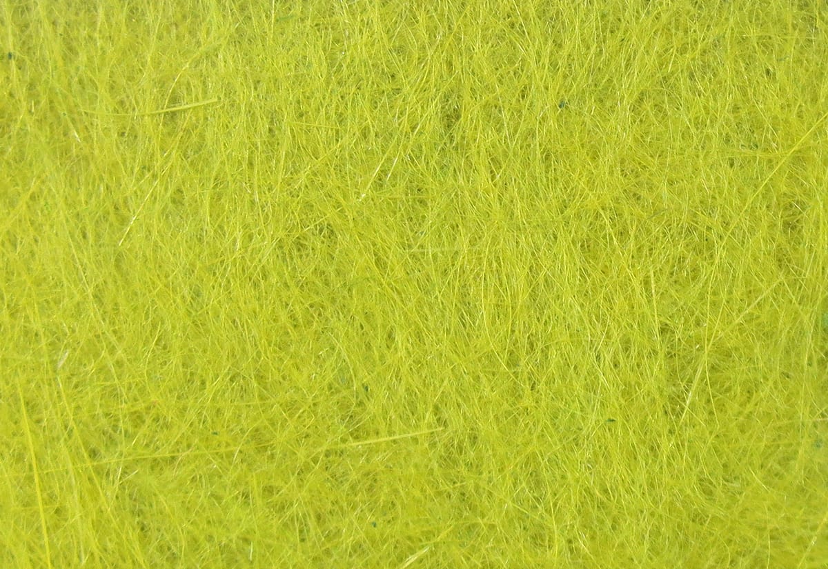 Fine fibrous chartreuse dubbing material for fly tying, soft synthetic fur fibers