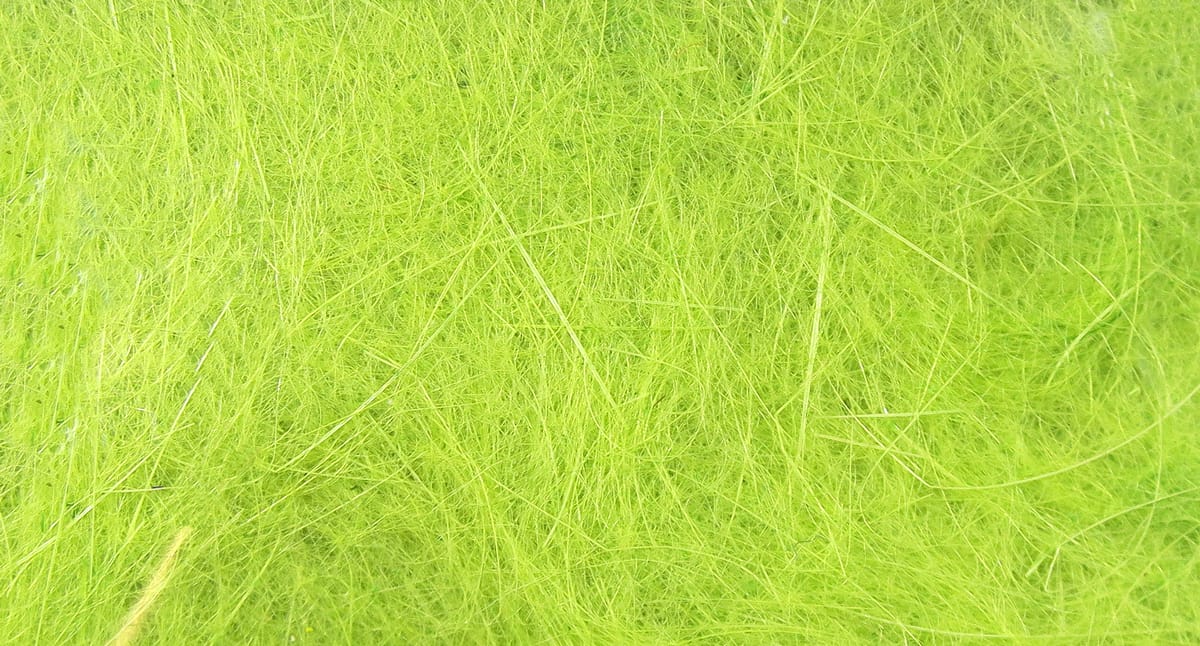 Hareline Dubbin chartreuse hare dubbing fibers, wispy fluffy texture for fly tying