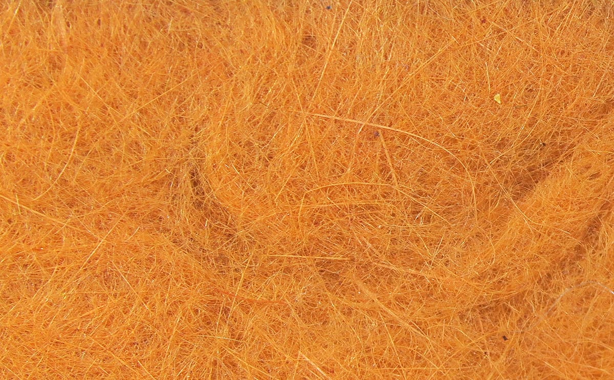 Hareline dubbin for fly tying, bright orange fine fibers with subtle gold sheen