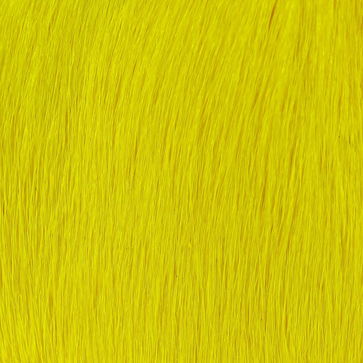 Hareline dyed deer belly hair bright yellow, fine soft strands for fly tying and streamer bodies
