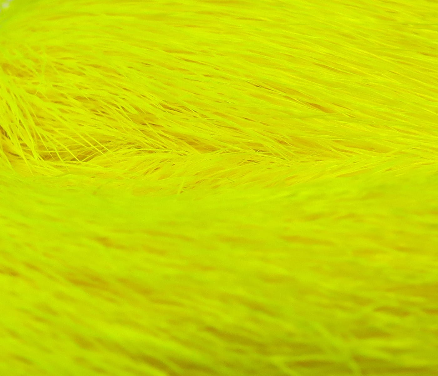 Bright chartreuse dyed deer belly hair with fine soft fibers, ideal for fly tying