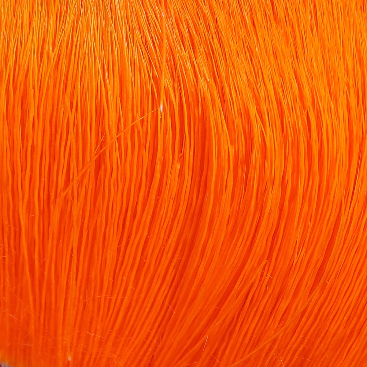 Bright fluorescent orange Hareline dyed deer belly hair, fine glossy strands for fly tying