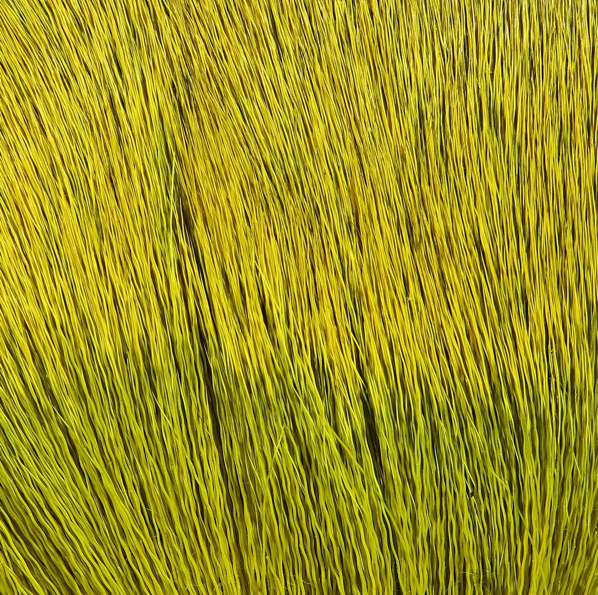 Bright chartreuse dyed deer body hair, long fine fibers for fly tying with smooth layered texture