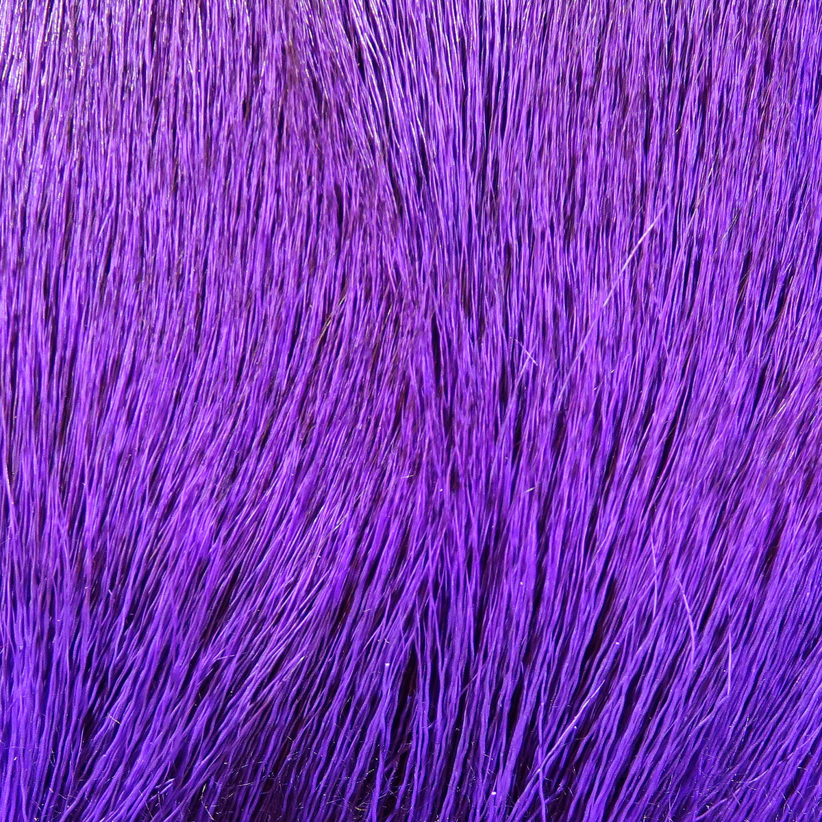 Vibrant purple dyed deer body hair with long fine fibers and glossy sheen for fly tying
