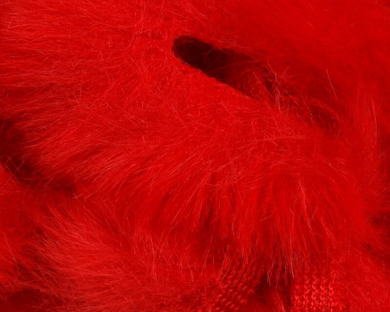 Bright red Hareline craft bunny strips, soft dense fur with long fibers for fly tying and crafting