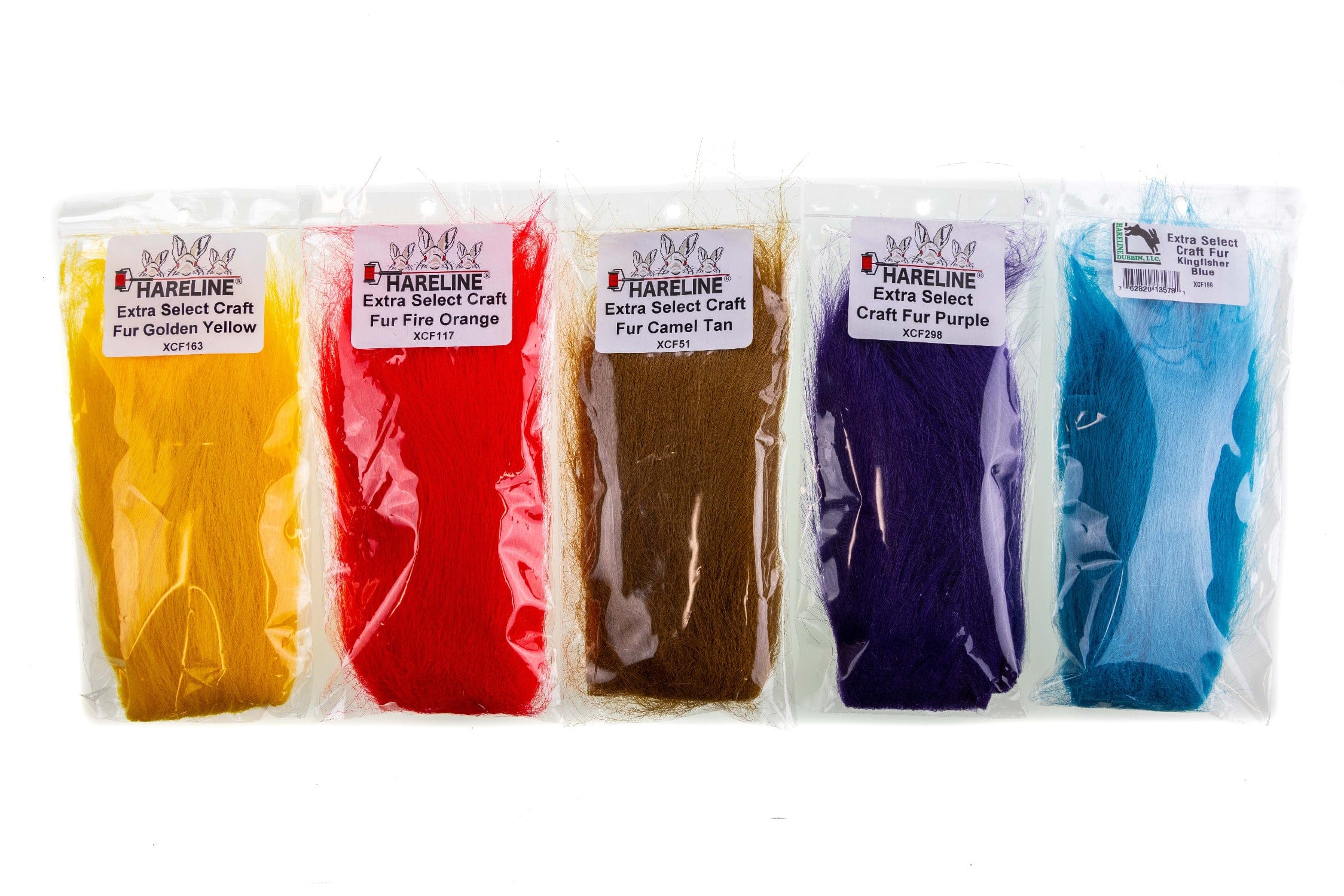 Hareline Extra Select craft fur packets in golden yellow, fire orange, camel tan, purple and kingfisher blue for fly tying