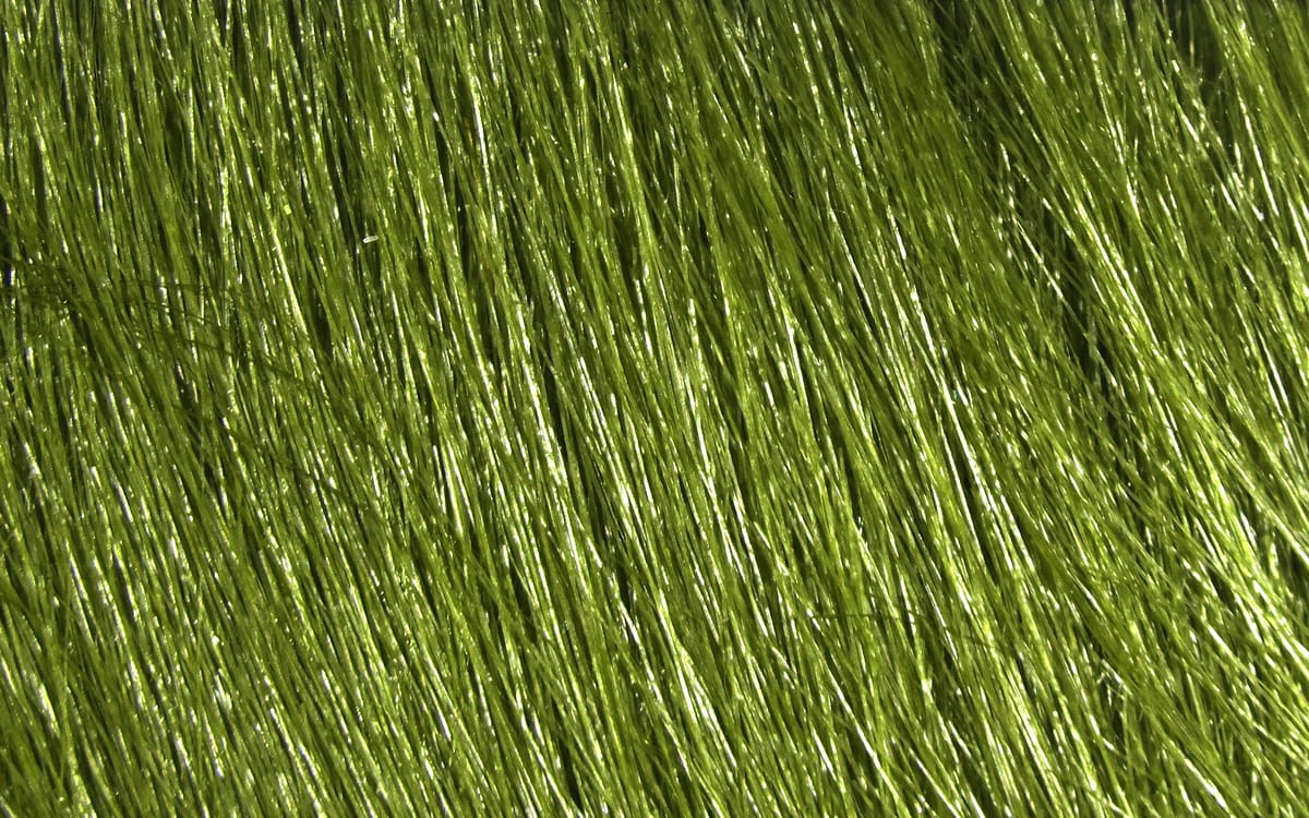 Olive green extra select craft fur with glossy long synthetic strands, ideal for fly tying