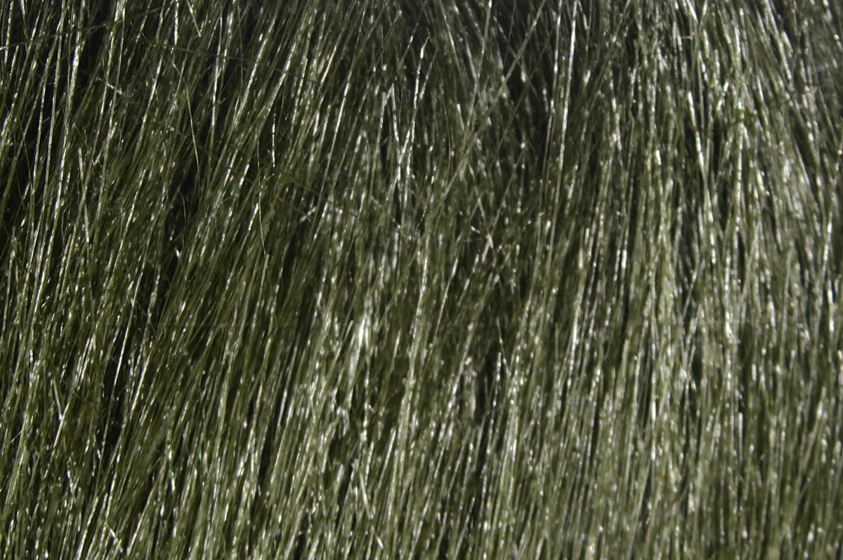 Olive green craft fur with long glossy synthetic fibers, dense flowing texture for fly tying