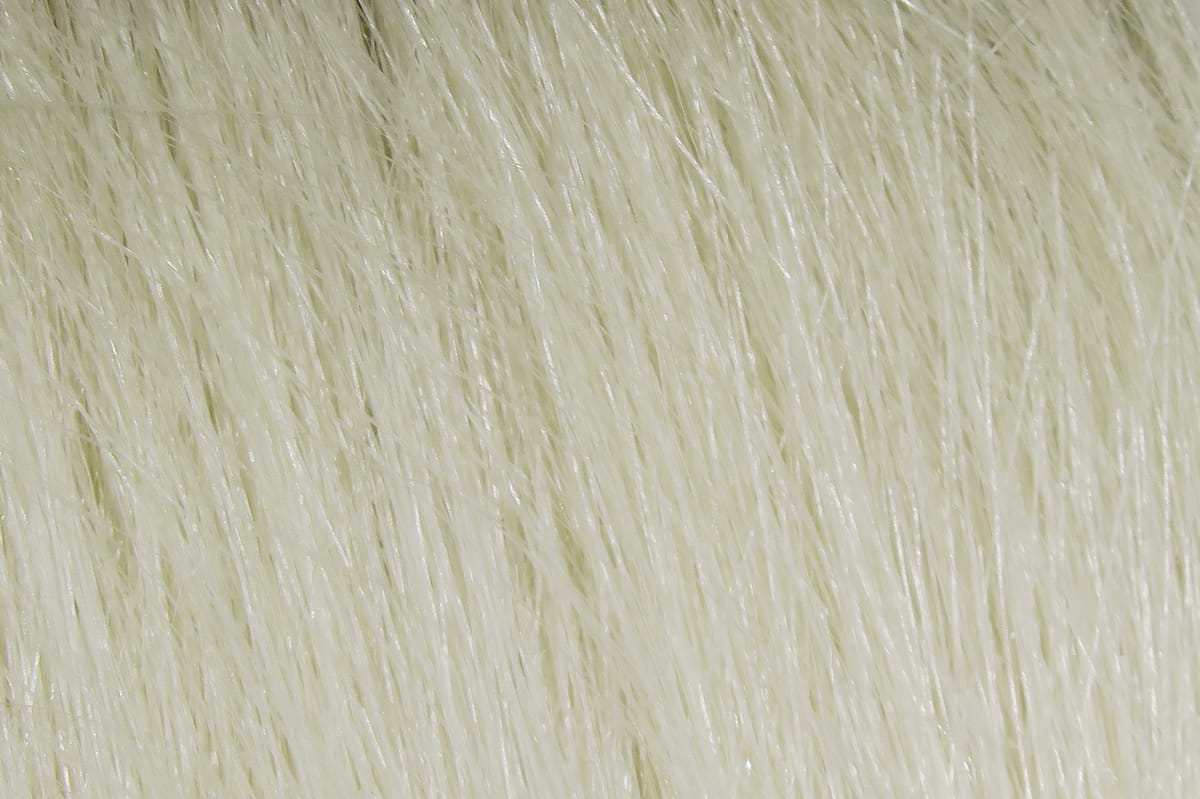 Pale cream Hareline Extra Select craft fur with long glossy synthetic fibers for fly tying