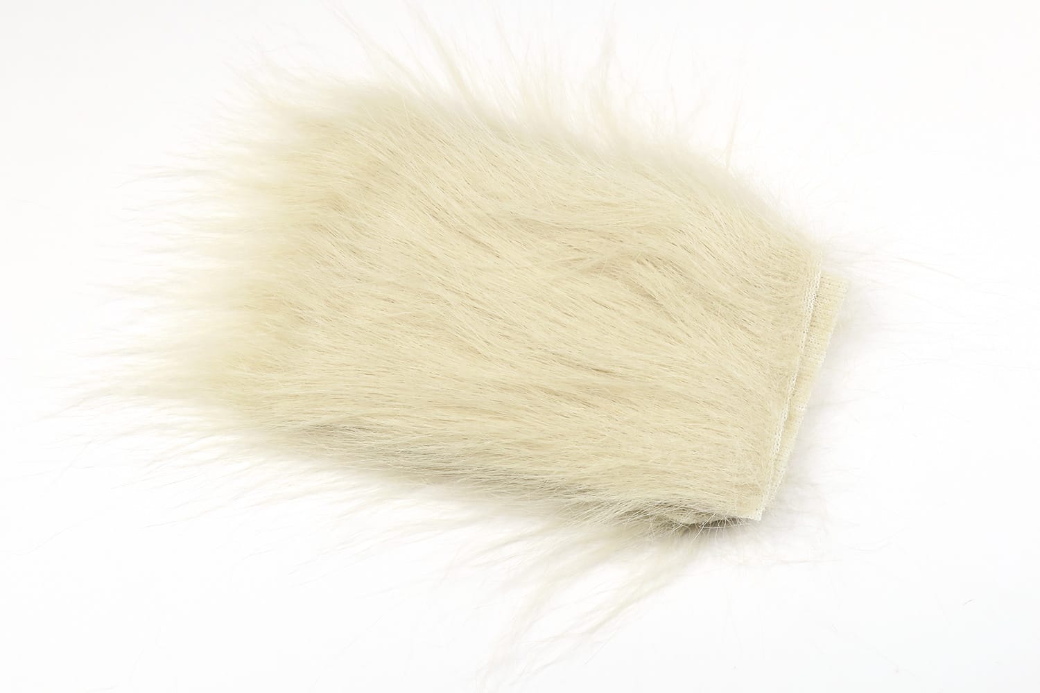 Cream Hareline Extra Select craft fur strip with long soft hairs and stitched backing for fly tying