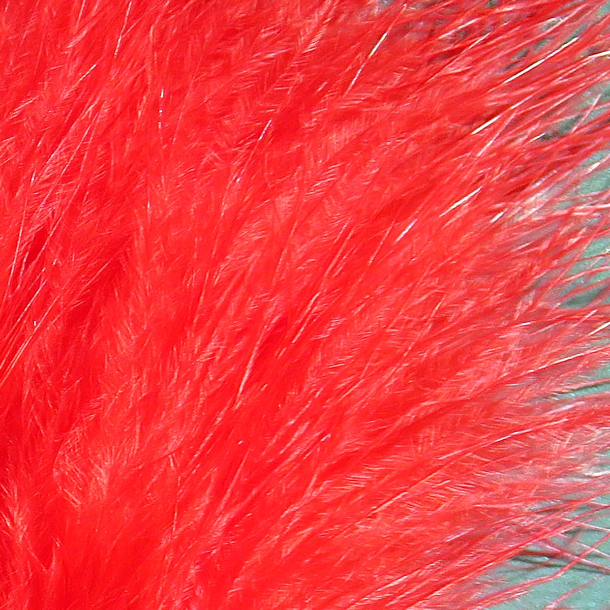 Bright red Hareline Extra Select marabou feathers, soft fluffy plumes with long wispy barbs for fly tying