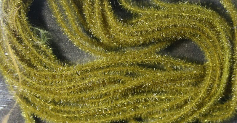 Olive green Hareline EZ Magic Dub synthetic dubbing with sparkling fibers for fly tying, fuzzy chenille strands