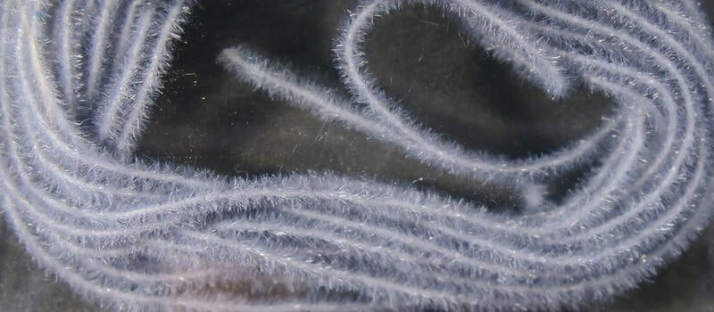 Pale lavender Hareline EZ Magic Dub synthetic fuzzy dubbing with sparkle fibers for fly tying