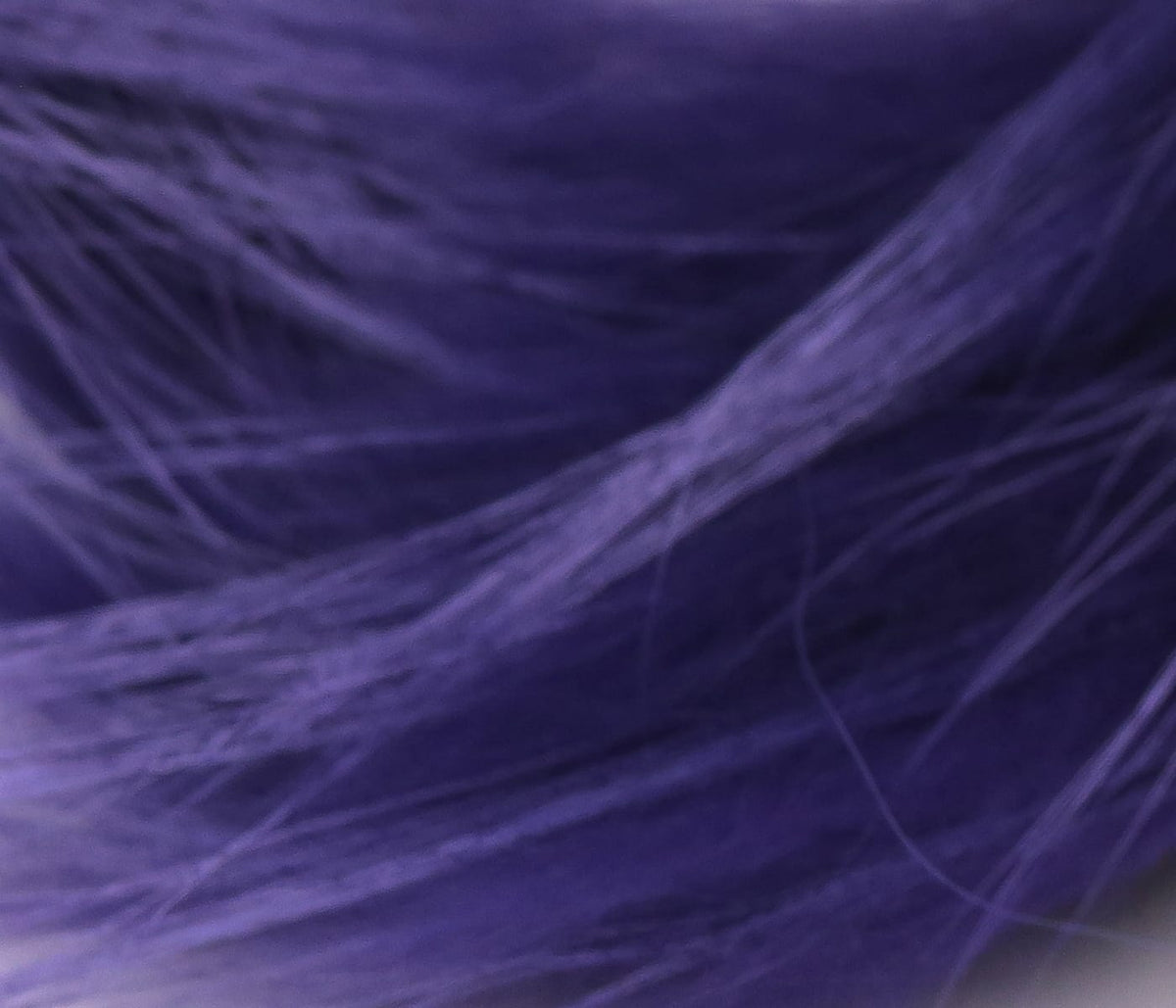 Deep purple raccoon zonker fur strips, soft long fibers with wispy texture for fly tying lures