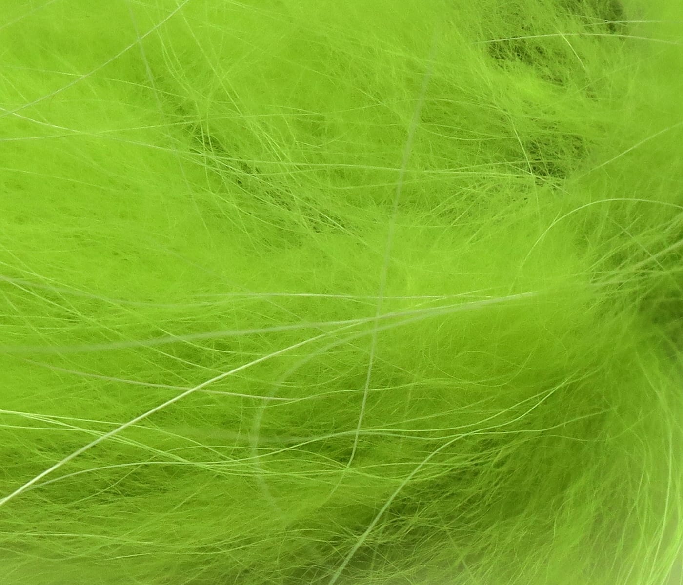Chartreuse Hareline Finn raccoon zonker strips, fluffy fur with long guard hairs for fly tying