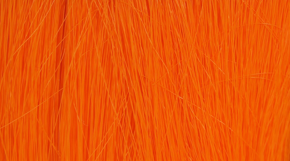 Bright fluorescent orange synthetic Fishair fibers, long fine glossy strands for fly tying lures
