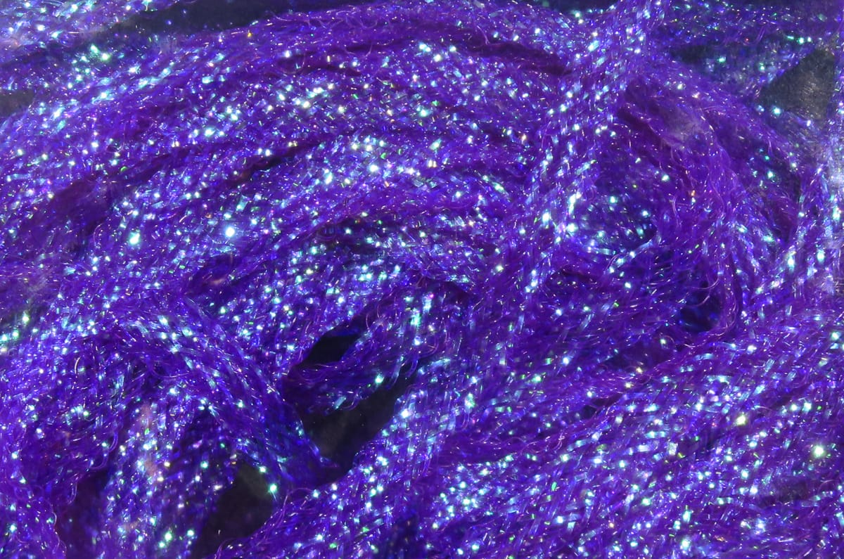 Hareline flat diamond braid, vivid iridescent purple synthetic with sparkling holographic strands for fly tying