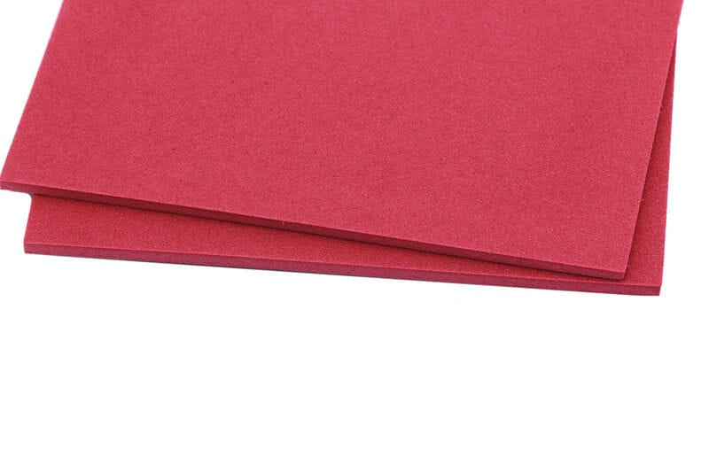Hareline red fly foam sheets, two stacked smooth craft foam panels for fly tying on white background