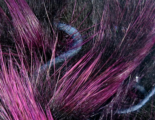 Hareline Frostip rabbit fur strips in black with vivid magenta-frosted tips, silky long hairs for fly tying