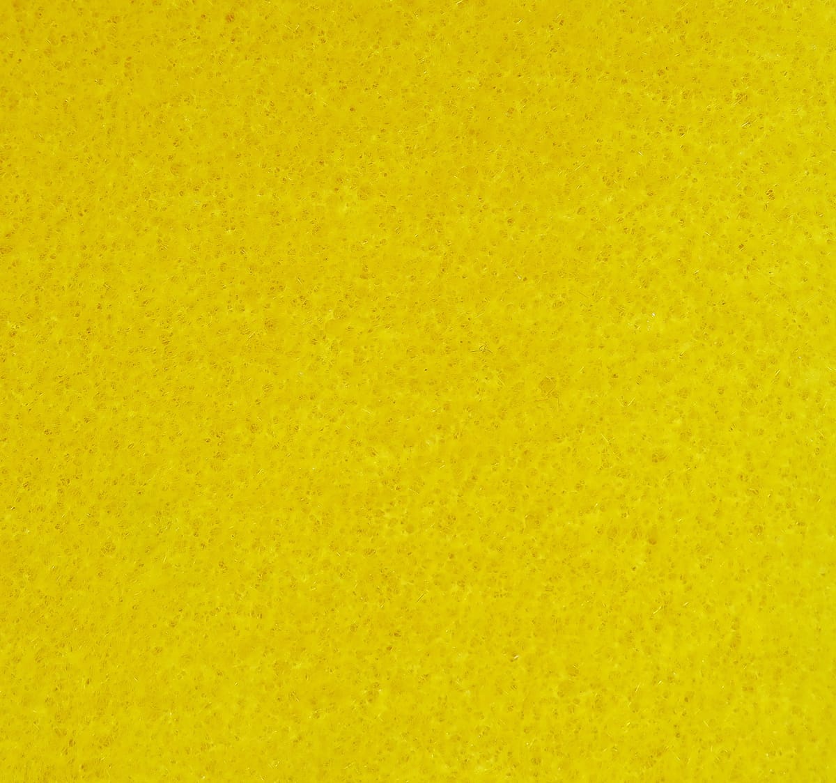 Bright yellow Hareline Furry Foam sheet with fine fuzzy texture for fly tying, soft synthetic material