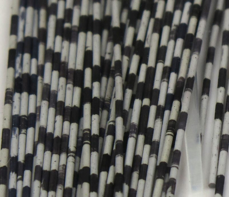 Hareline grizzly barred rubber legs, black and white striped flexible rubber strands for fly tying