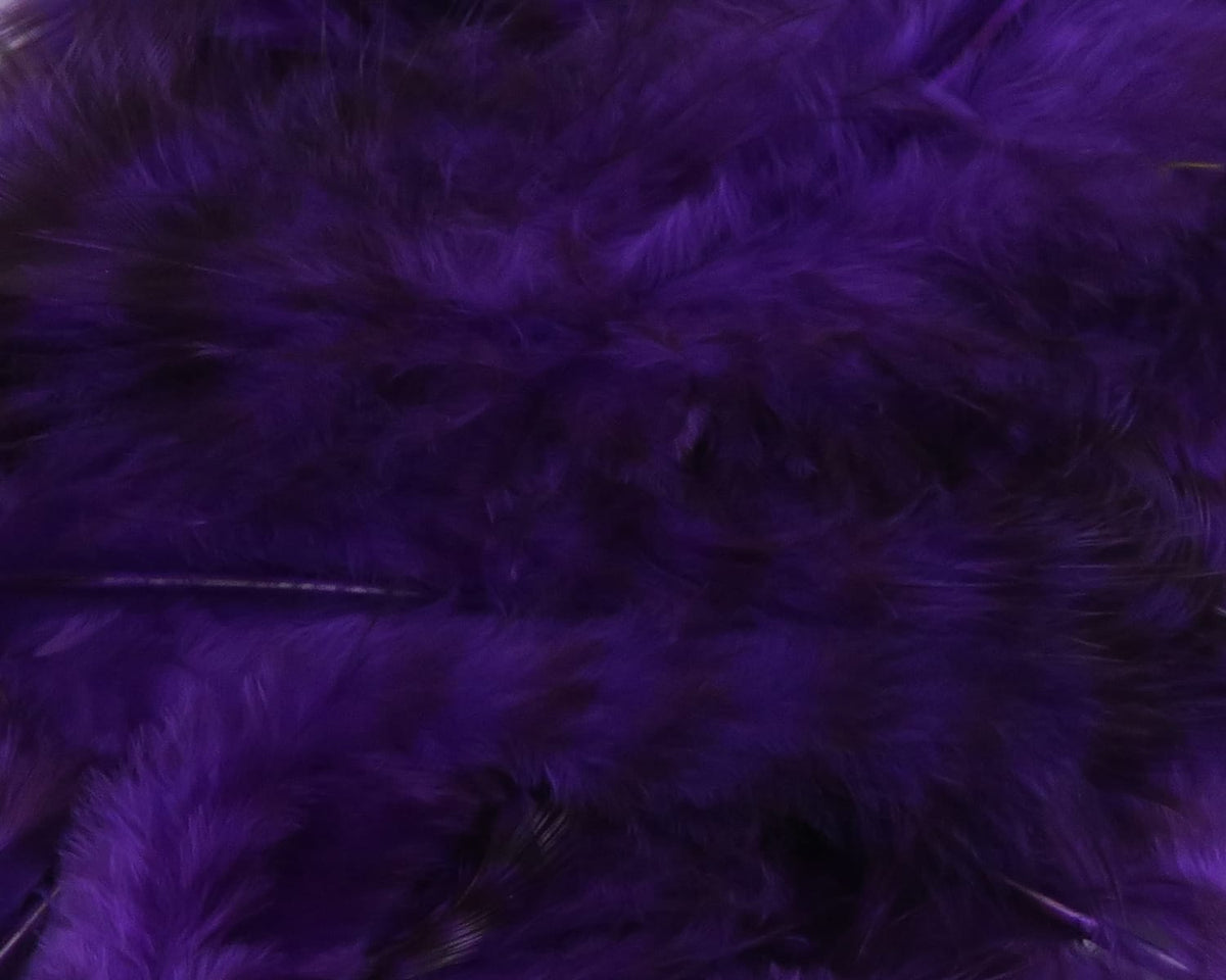 Hareline grizzly soft hackle feathers in deep purple, fluffy dyed fibers with subtle dark barring for fly tying