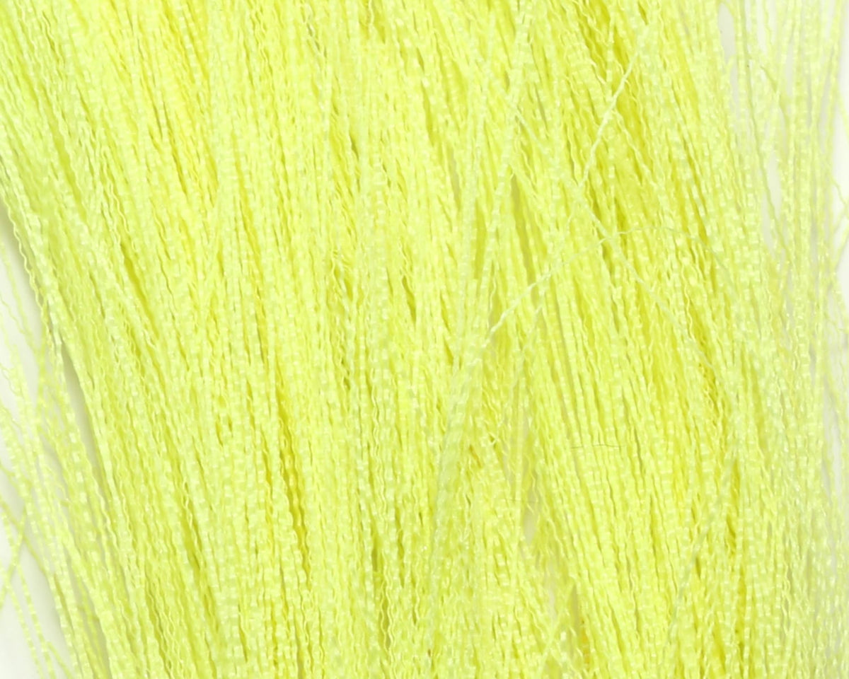 Chartreuse yellow synthetic hackle hair, crimped glossy strands for fly tying and streamer bodies