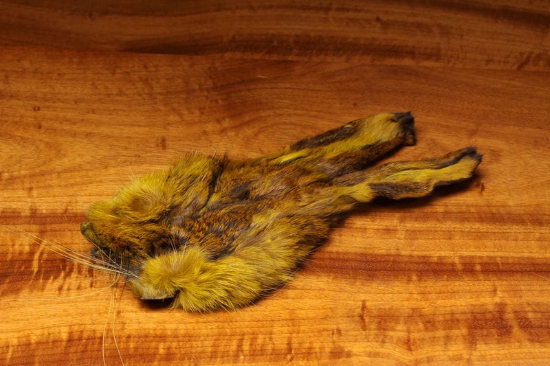 Olive-yellow and brown dyed hare mask with soft fur, long ears and whiskers, natural hide for fly tying