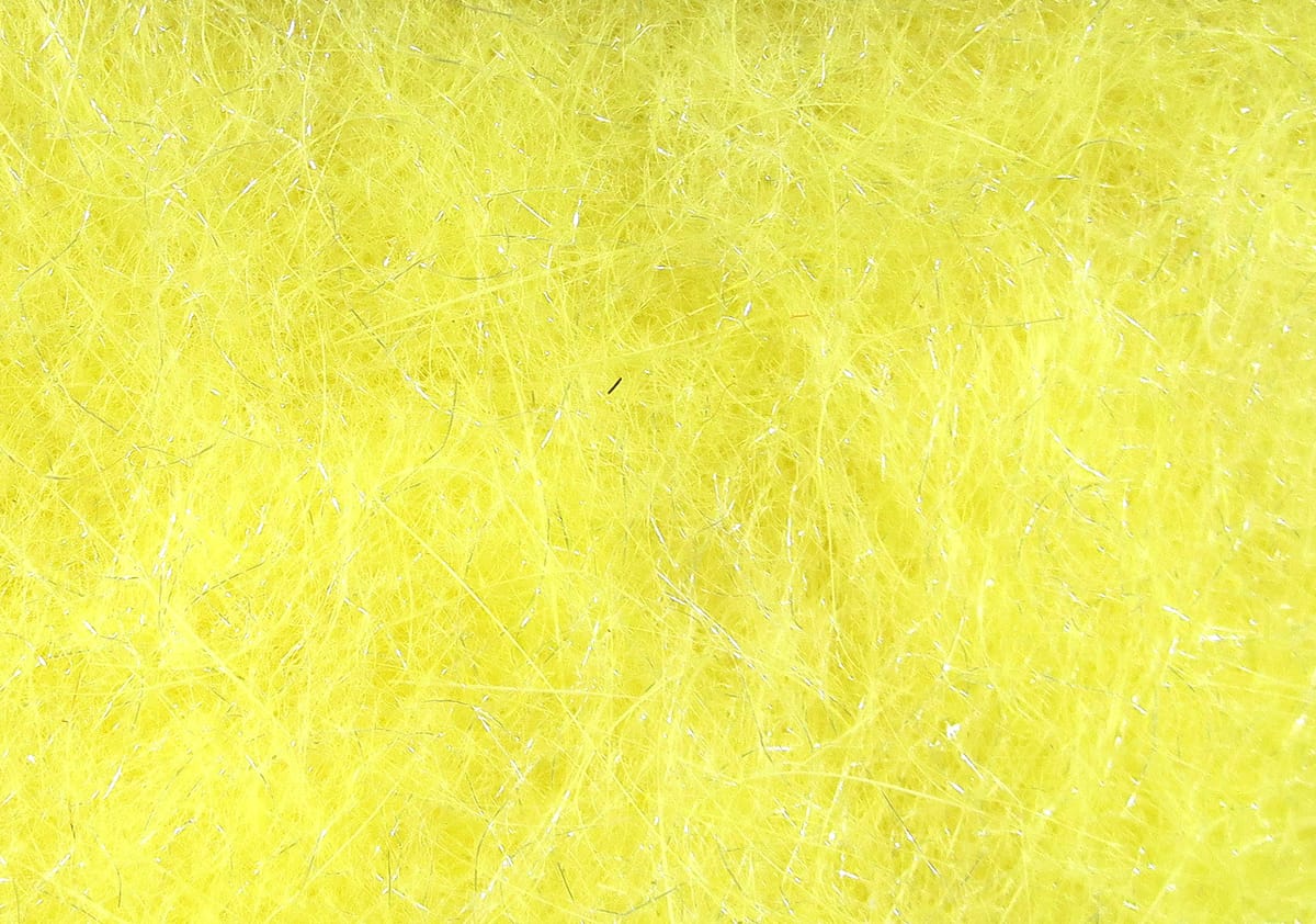 Bright yellow Hareline Hare-Tron synthetic dubbing with fine fibers and silver flash for fly tying