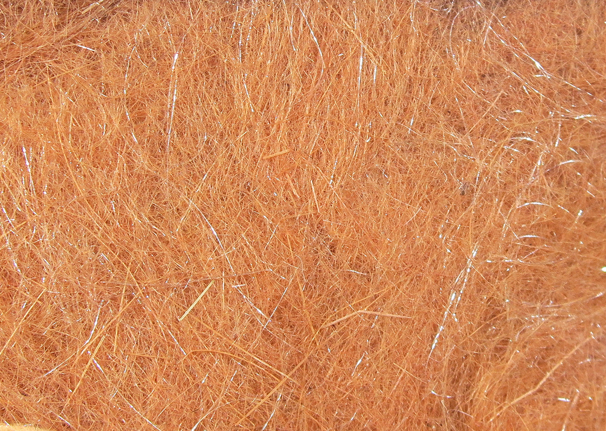 Copper-orange synthetic Hare-Tron dubbing fibers with subtle silver flash strands for fly tying