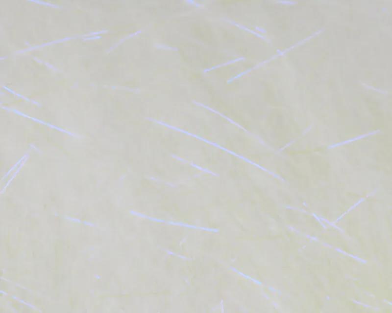 Pale cream Ice Dub shimmer fringe with thin iridescent blue strands, synthetic fly tying dubbing material