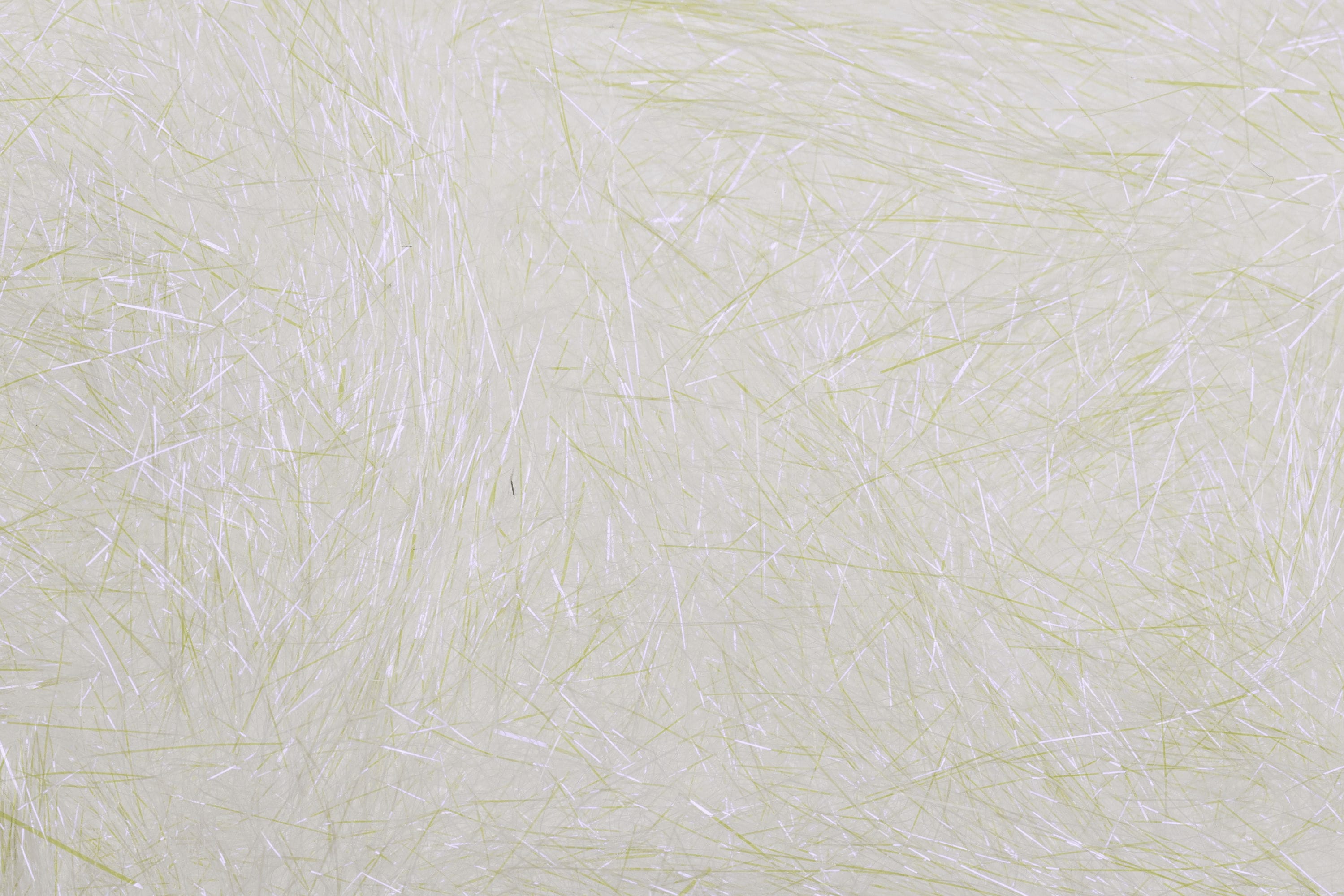 Pale chartreuse and pearlescent white synthetic ice dubbing with fine, wispy translucent fibers for fly tying