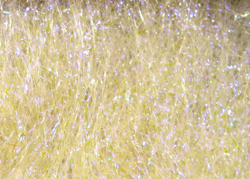 Pale yellow Hareline ice dubbing fibers with iridescent tinsel sparkle, fine synthetic material for fly tying