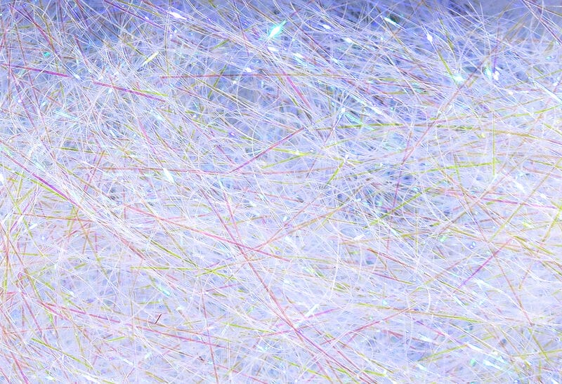 Hareline ice dubbing: iridescent white synthetic fibers with fine pastel strands and holographic sparkle for fly tying