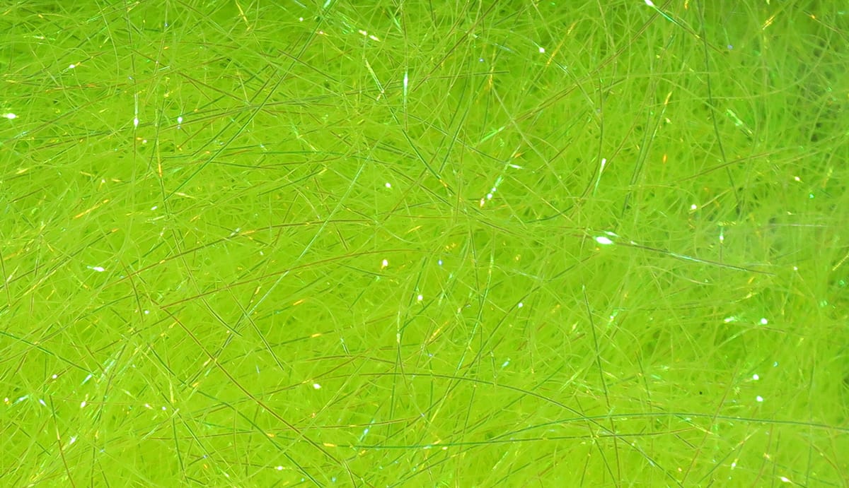 Chartreuse Hareline Ice Dubbing with fine synthetic fibers and iridescent tinsel strands for fly tying