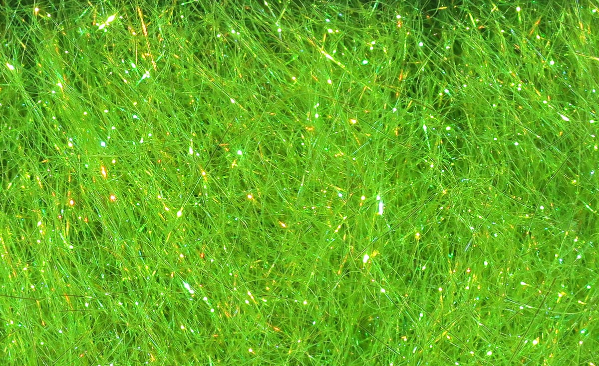 Hareline Ice Dubbing bright chartreuse synthetic dubbing fibers with iridescent sparkle for fly tying