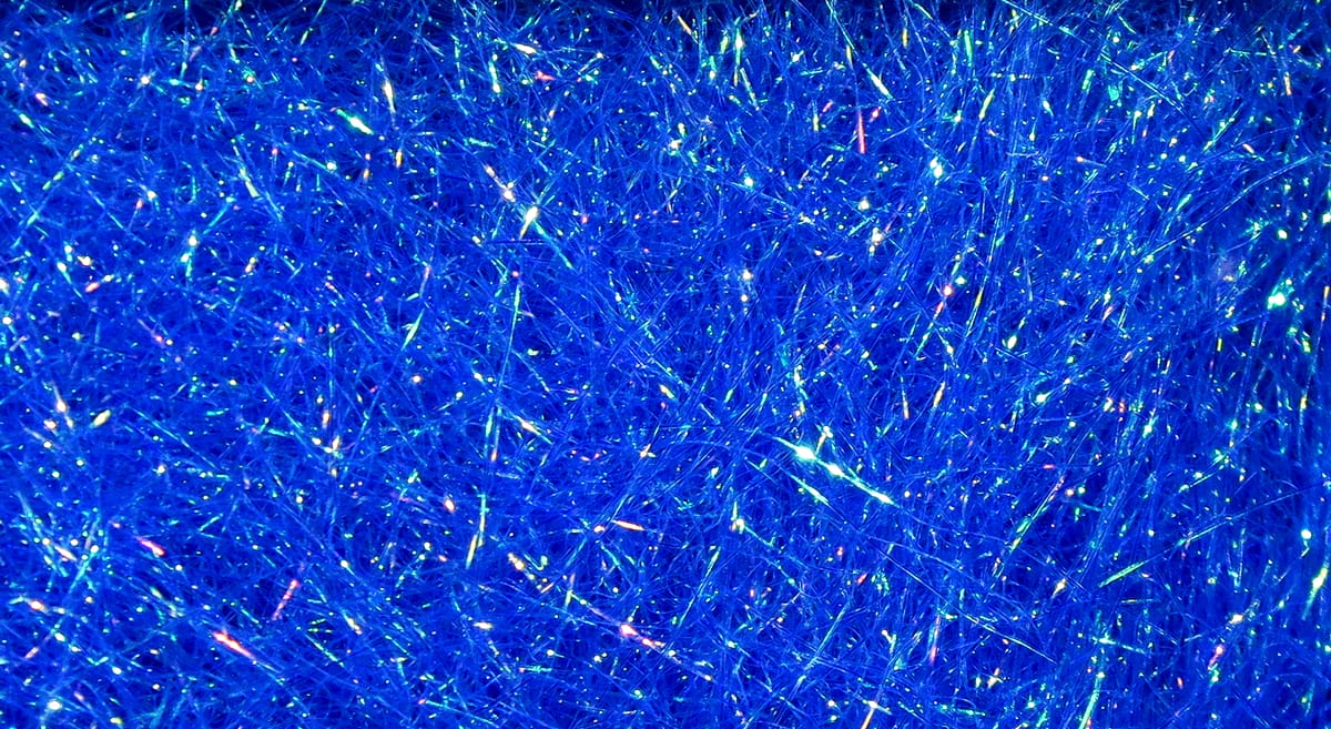 Hareline ice dubbing synthetic blue sparkle fibers with iridescent tinsel for fly tying