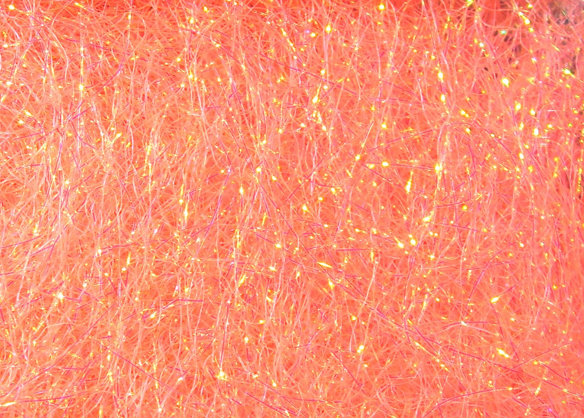 Hareline Ice Dubbing coral-pink synthetic fibers with iridescent sparkle for fly tying