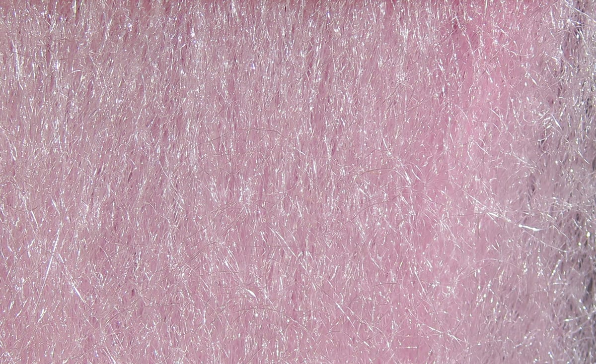 Pale pink Hareline Ice Fur synthetic fur for fly tying, fluffy fine fibers with silver iridescent sparkle