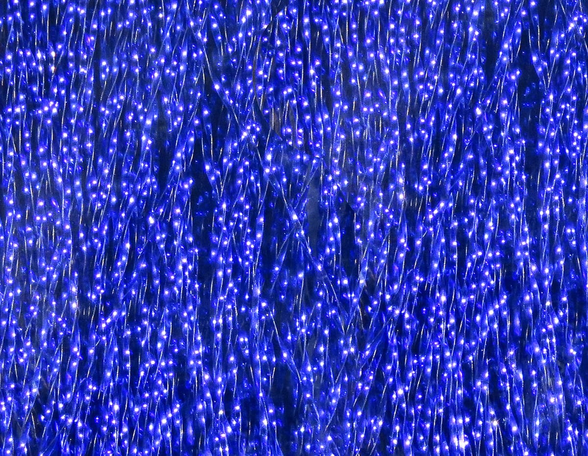 Hareline Krystal Flash blue iridescent synthetic flash fibers with sparkling reflective strands for fly tying