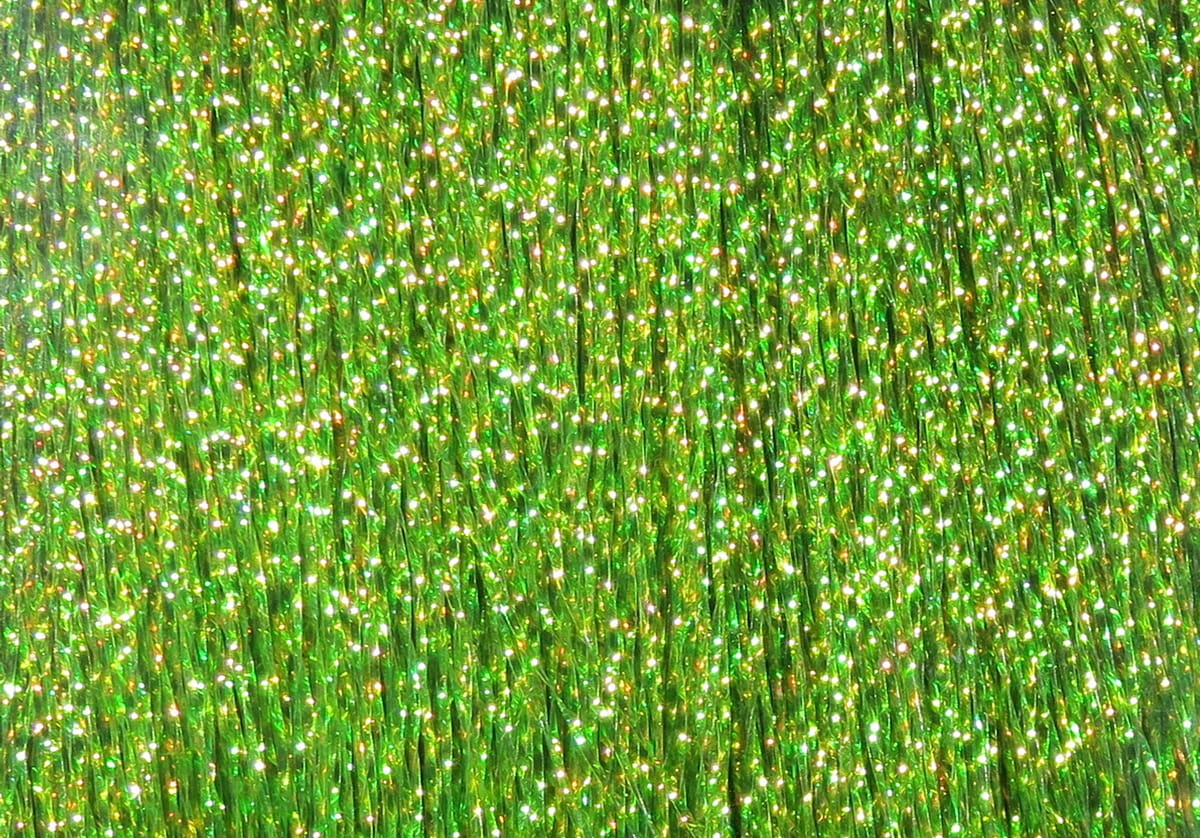 Hareline Krystal Flash bright green holographic synthetic strands with gold iridescent sparkle for fly tying.
