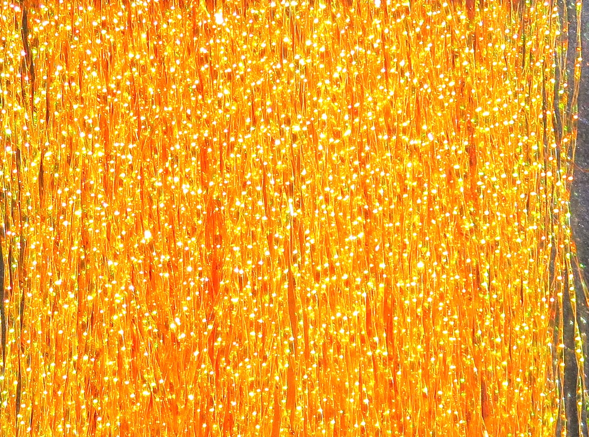 Hareline Krystal Flash fly tying material, dense orange iridescent synthetic strands with sparkling holographic flakes