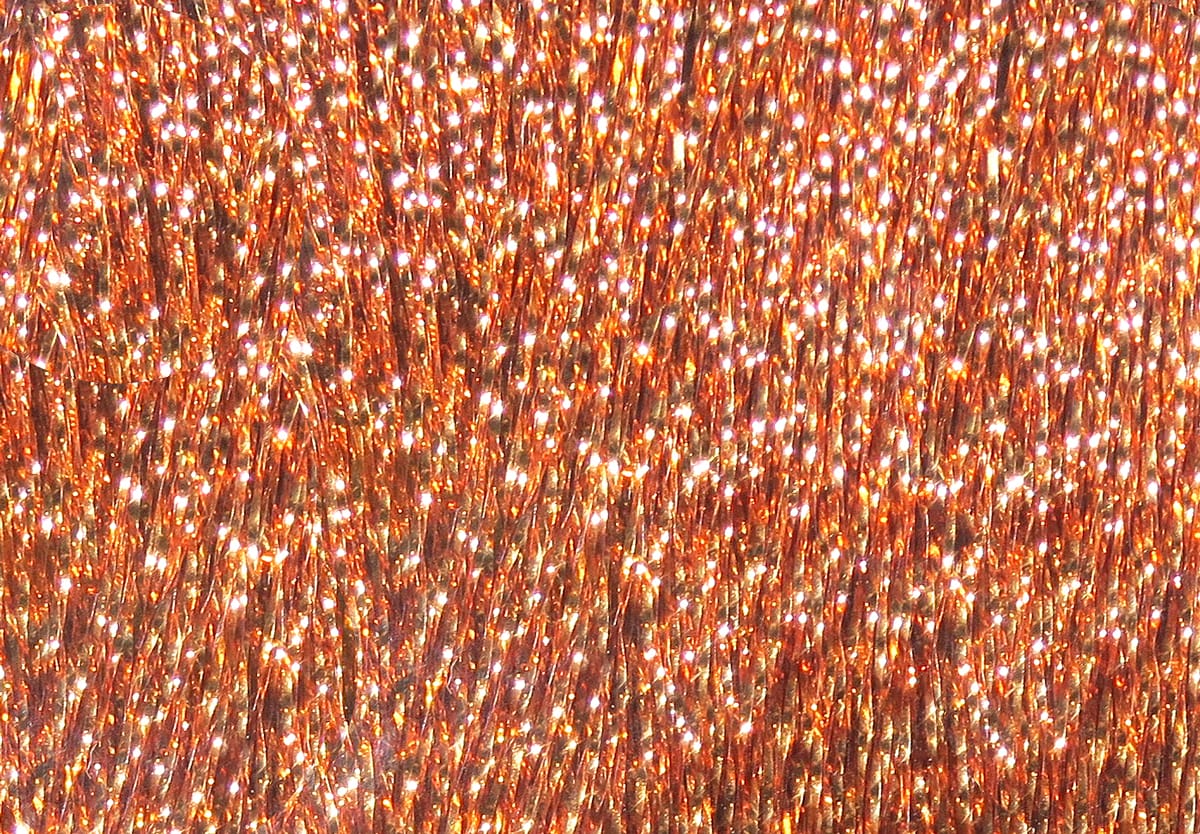 Krystal Flash copper-orange metallic strands for fly tying, shimmery reflective synthetic fibers