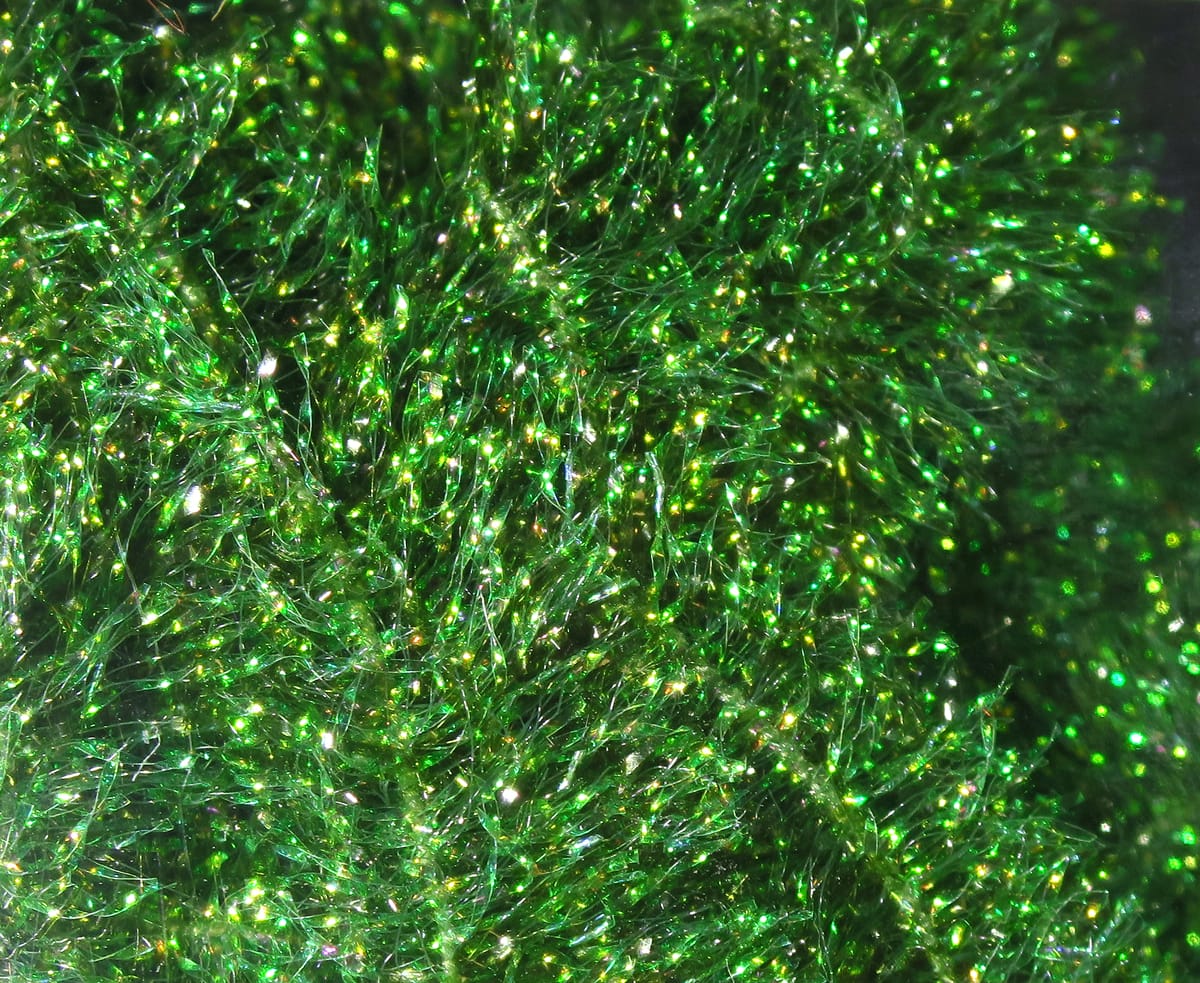 Bright green Krystal Flash chenille fibers with iridescent sparkle, long fluffy strands for fly tying.