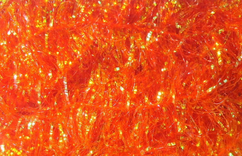 Bright orange Krystal Flash chenille with iridescent tinsel-like synthetic fibers and sparkling flash for fly tying