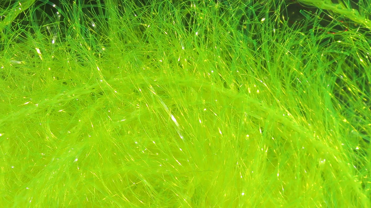 Chartreuse synthetic Krystal Hackle fibers with sparkling tinsel strands for fly tying
