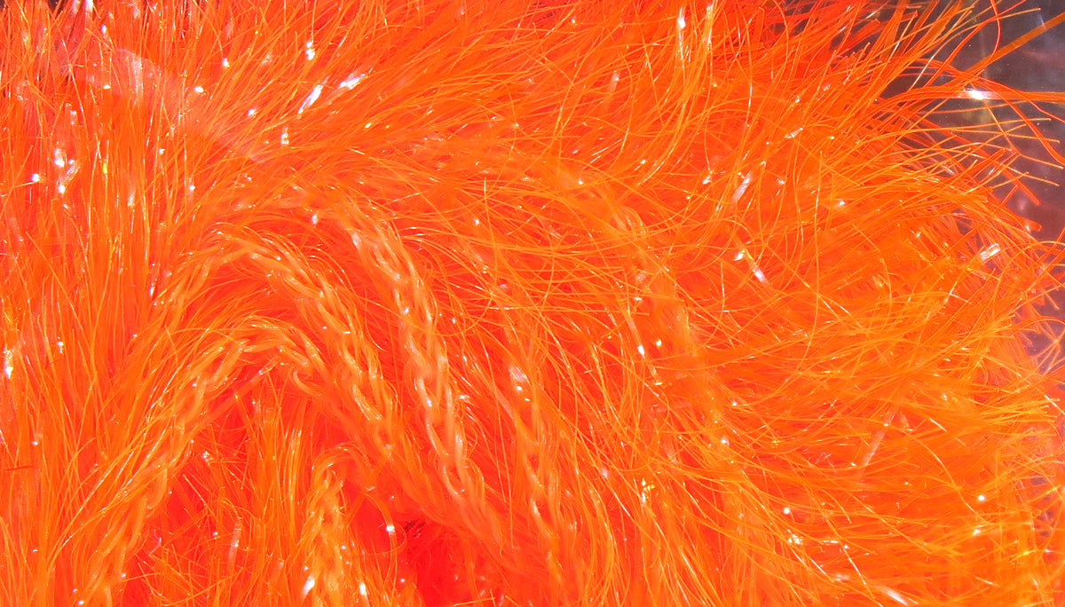 Hareline Krystal Hackle bright orange synthetic fibers with sparkling tinsel strands, fluffy hackle for fly tying